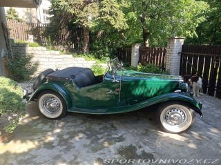 MG  TD